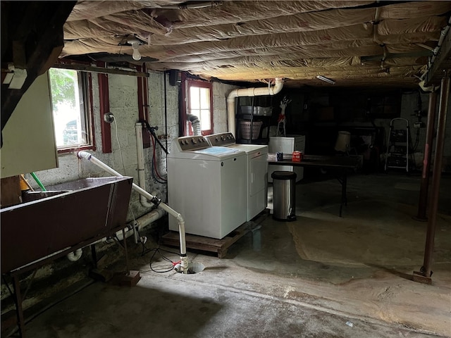 basement featuring washer and dryer and plenty of natural light