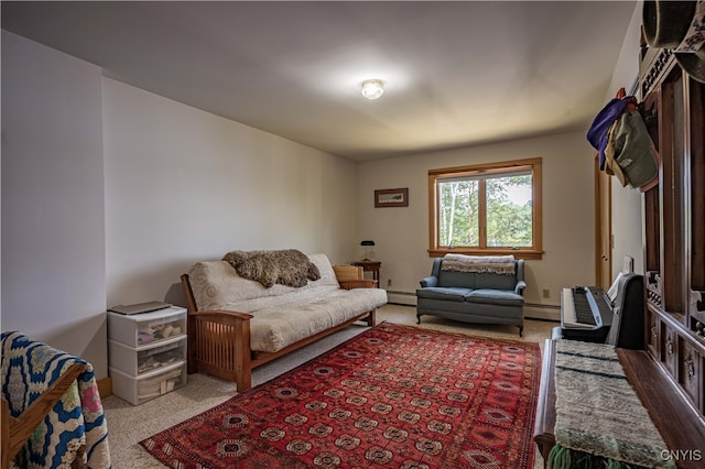 living room with a baseboard heating unit and carpet floors