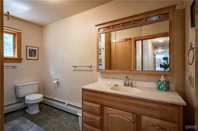 bathroom featuring vanity, toilet, and a baseboard radiator