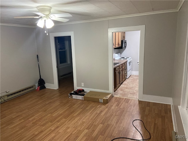 interior space featuring ceiling fan, light tile patterned floors, ensuite bathroom, and ornamental molding