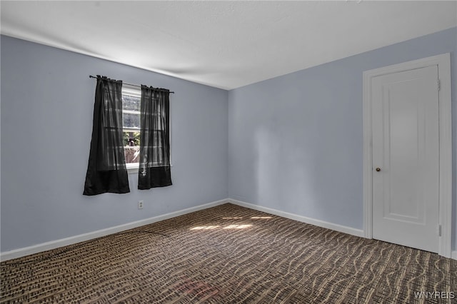 spare room with carpet