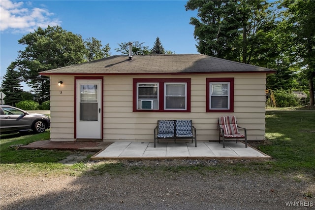 exterior space featuring a yard and a patio area