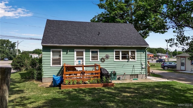 bungalow with a front yard