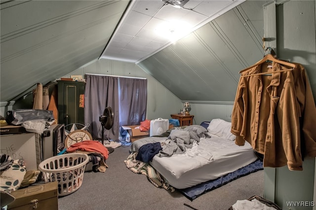 bedroom with lofted ceiling and carpet flooring