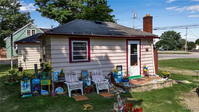 exterior space with a lawn