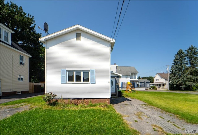 exterior space with a lawn