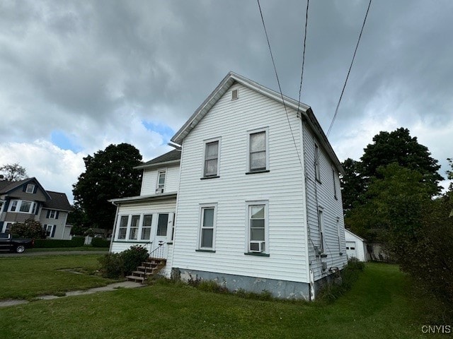 exterior space featuring a front lawn