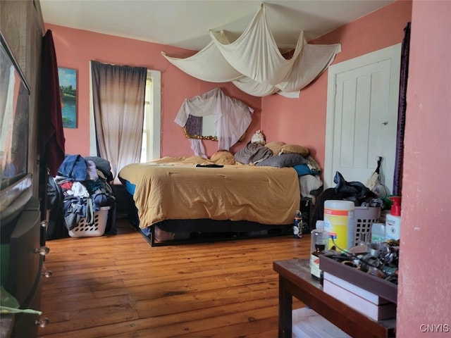 bedroom featuring hardwood / wood-style flooring