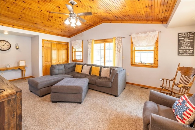 living area with baseboards, a ceiling fan, lofted ceiling, wooden ceiling, and carpet floors