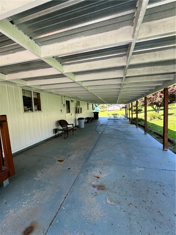 view of patio / terrace with a carport