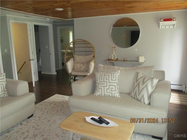 living area featuring wood finished floors, a baseboard heating unit, and wooden ceiling
