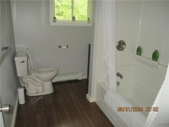 bathroom with toilet, shower / bath combo, wood finished floors, baseboards, and a baseboard heating unit