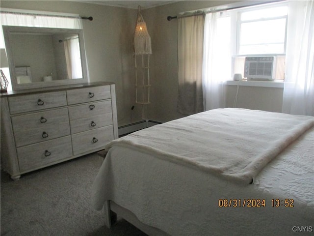 carpeted bedroom featuring cooling unit and baseboard heating