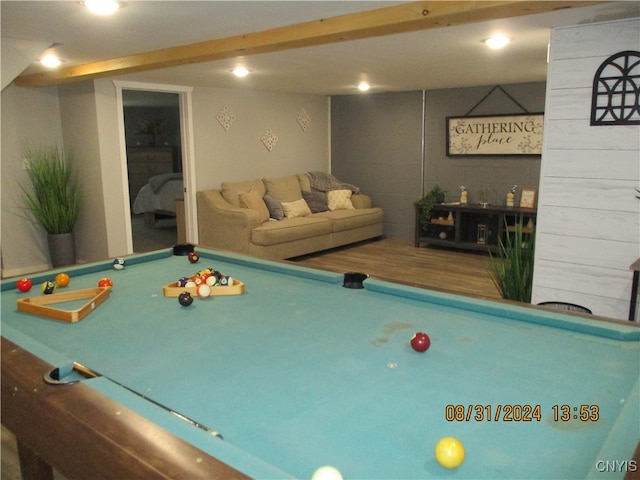 playroom featuring hardwood / wood-style floors, beam ceiling, and pool table