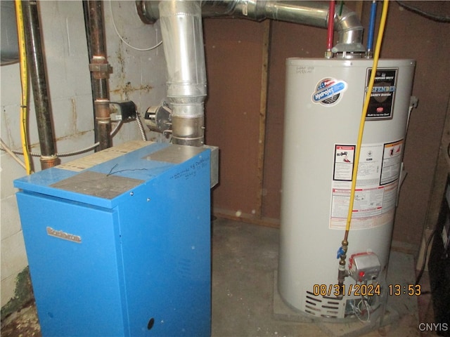 utility room with gas water heater