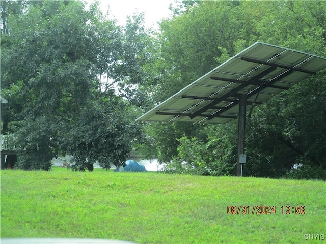 view of yard featuring a carport