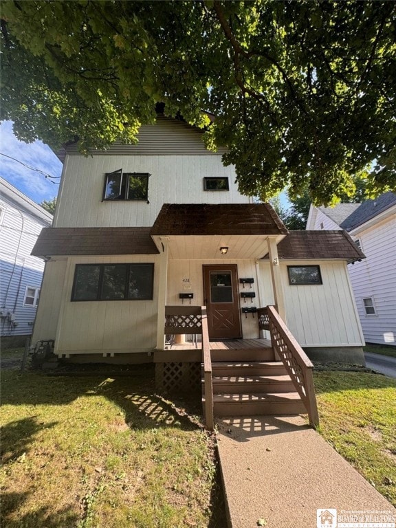 view of front of property with a front lawn