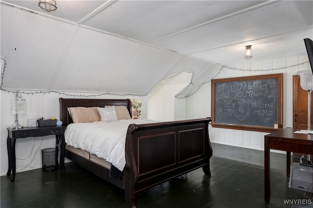 bedroom with lofted ceiling