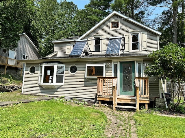 view of front of house featuring a front lawn