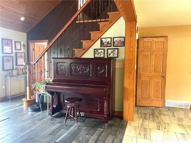 misc room featuring vaulted ceiling, wooden ceiling, and hardwood / wood-style floors