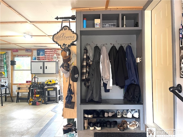 mudroom featuring concrete flooring