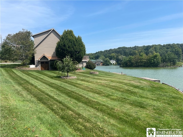 view of yard with a water view