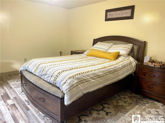 bedroom featuring hardwood / wood-style flooring