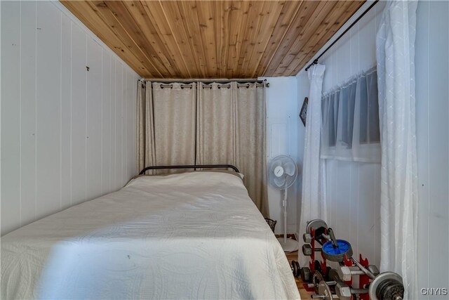 bedroom featuring wooden ceiling