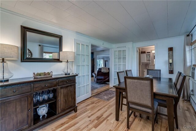 dining area with light hardwood / wood-style flooring