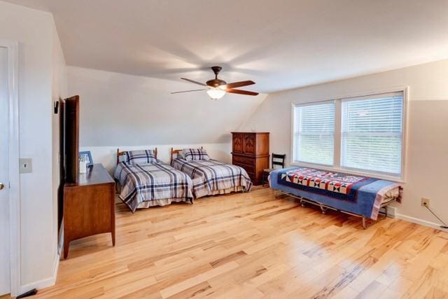 1090 Park Hill Rd, Colchester, NY 13755 - bedroom featuring baseboards, a ceiling fan, vaulted ceiling, and wood finished floors