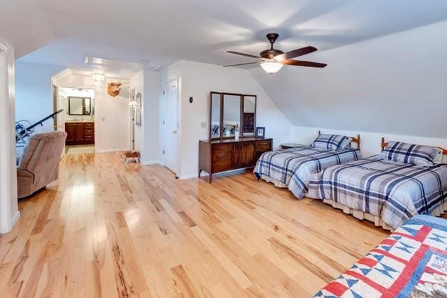 1090 Park Hill Rd, Colchester, NY 13755 - bedroom featuring baseboards, ceiling fan, vaulted ceiling, and light wood finished floors