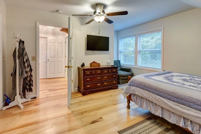 1090 Park Hill Rd, Colchester, NY 13755 - bedroom with a ceiling fan and light wood-style floors