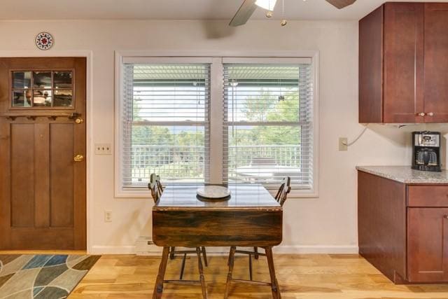 1090 Park Hill Rd, Colchester, NY 13755 - dining area featuring ceiling fan, baseboards, and light wood finished floors