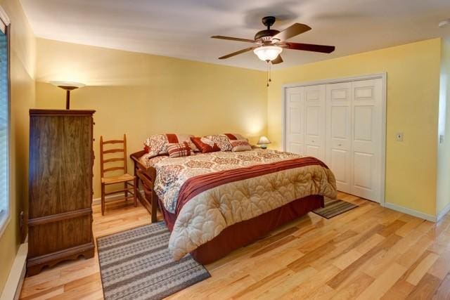 1090 Park Hill Rd, Colchester, NY 13755 - bedroom with baseboards, a ceiling fan, a closet, and light wood finished floors