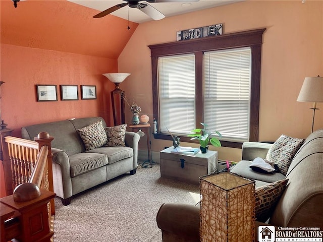 carpeted living room with vaulted ceiling and ceiling fan