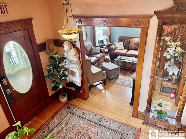 foyer featuring a healthy amount of sunlight and hardwood / wood-style floors