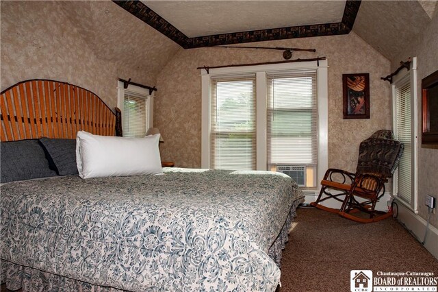 carpeted bedroom with vaulted ceiling