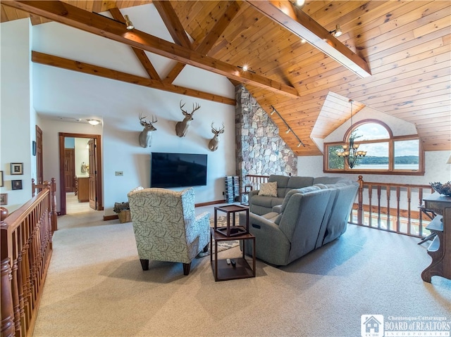 living room with wooden ceiling, lofted ceiling with beams, and carpet