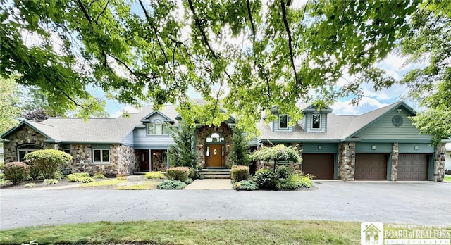 view of front of property with a garage