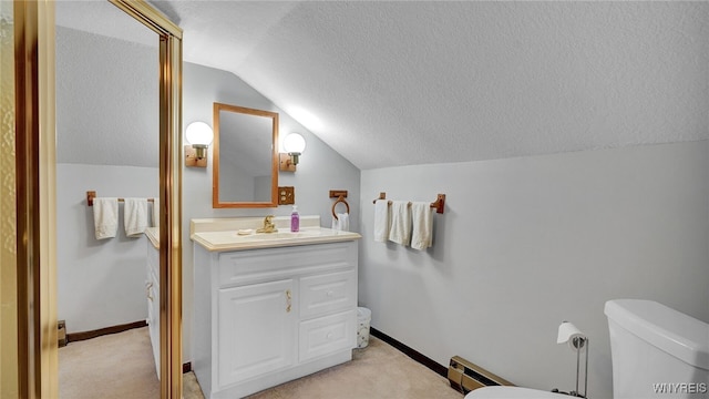 bathroom with toilet, vanity, a textured ceiling, a baseboard radiator, and lofted ceiling