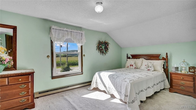 bedroom featuring a baseboard heating unit, light colored carpet, a textured ceiling, and lofted ceiling