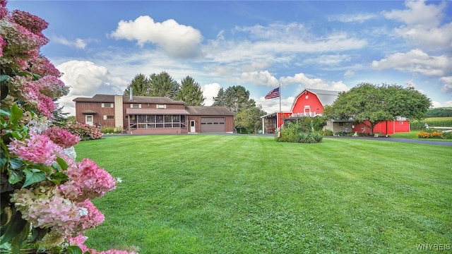 view of yard with a garage