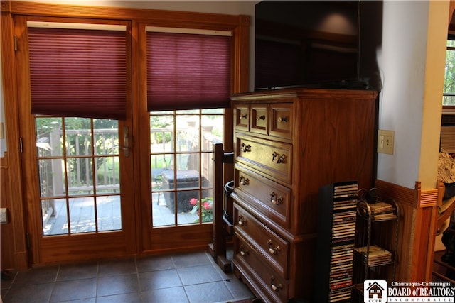 entryway with tile patterned floors