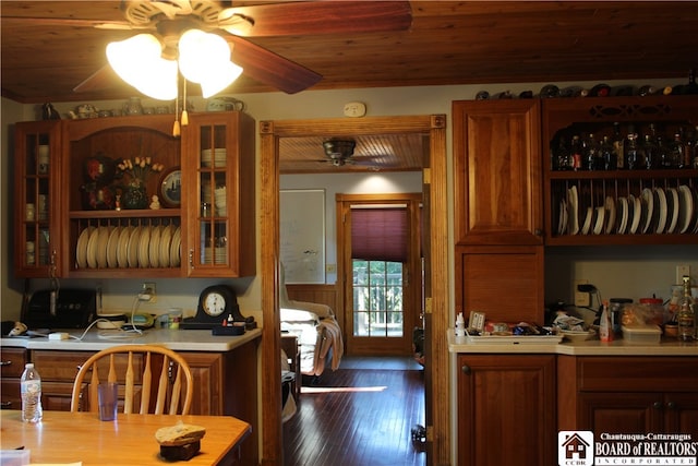 kitchen with hardwood / wood-style floors and ceiling fan