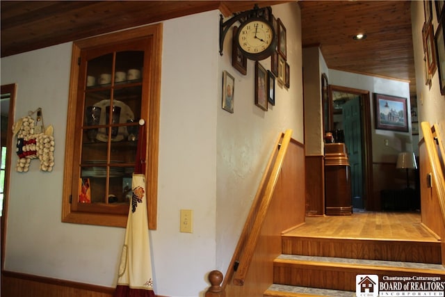 stairway featuring wood ceiling