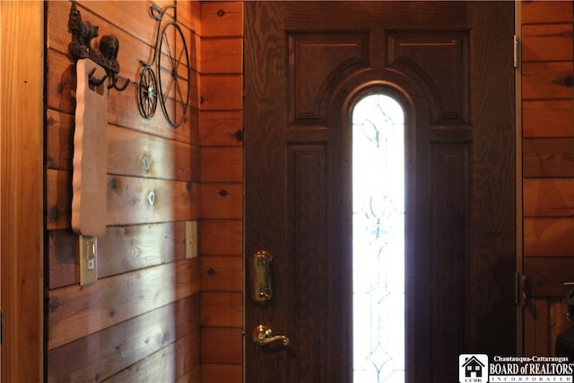 room details featuring wooden walls