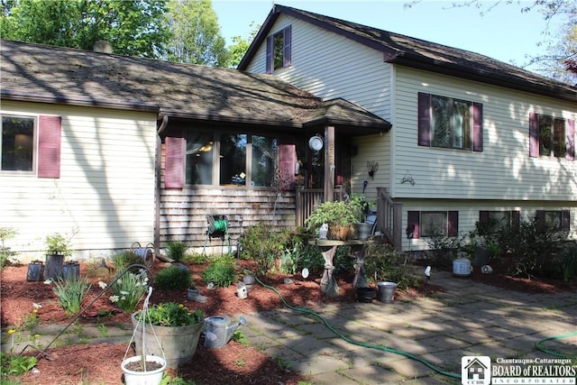 222 Seymour St, Pomfret, NY 14063 - tri-level home featuring a patio area