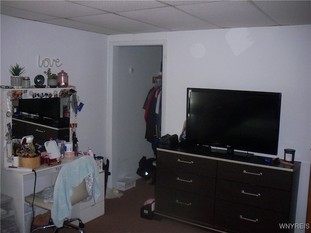 bedroom with a drop ceiling