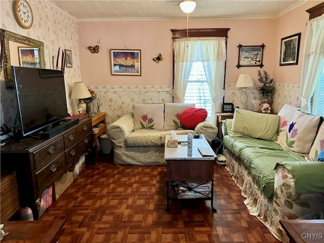 living room featuring crown molding and dark parquet floors