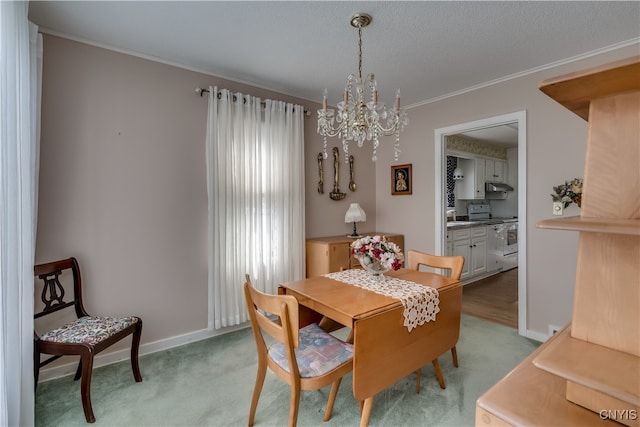 carpeted dining room featuring crown molding, a notable chandelier, and a textured ceiling